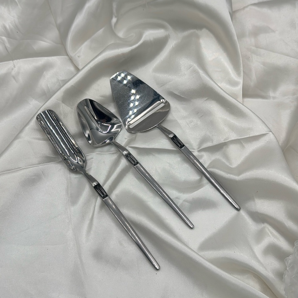 Arthur Salm Mid-Century Modern stainless steel cheese serving pieces;Japan